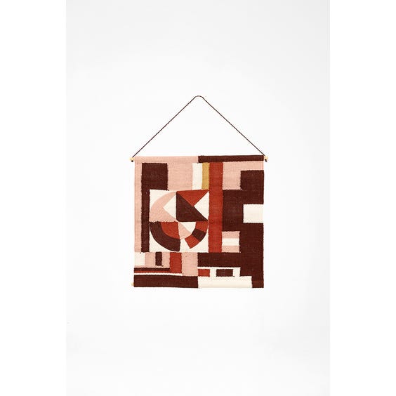 image of Pink geometric wall hanging
