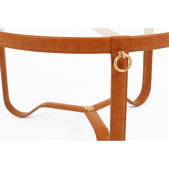 Tan leather circular coffee table image
