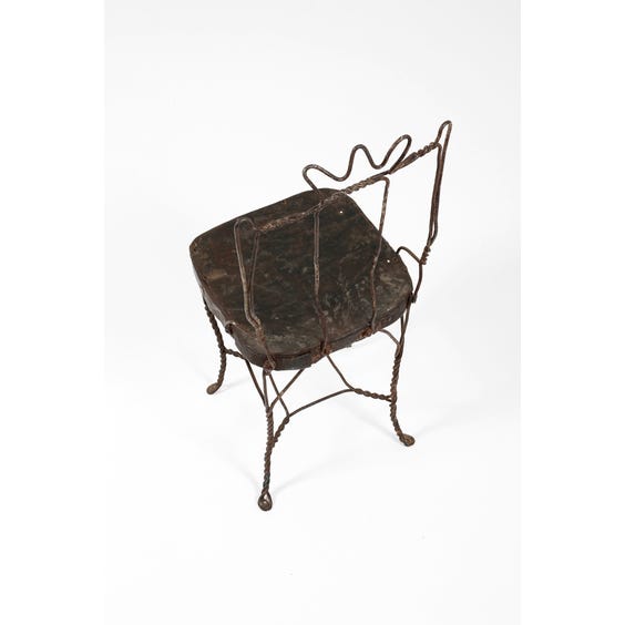 image of Rustic metal twisted wire chair