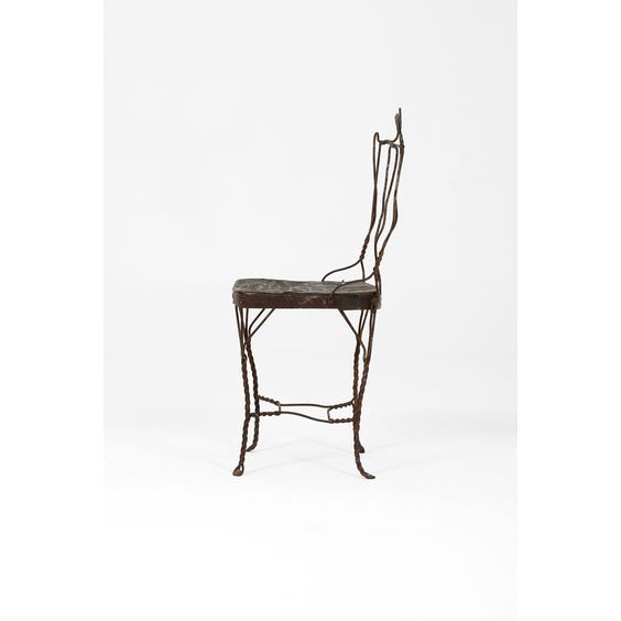 image of Rustic metal twisted wire chair