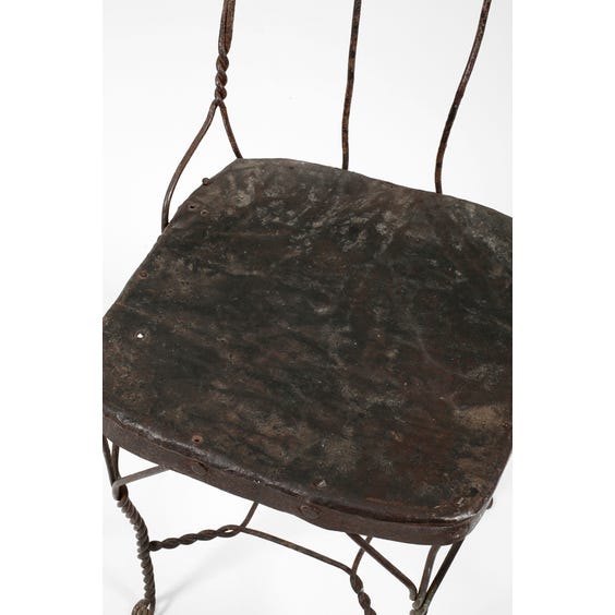 image of Rustic metal twisted wire chair