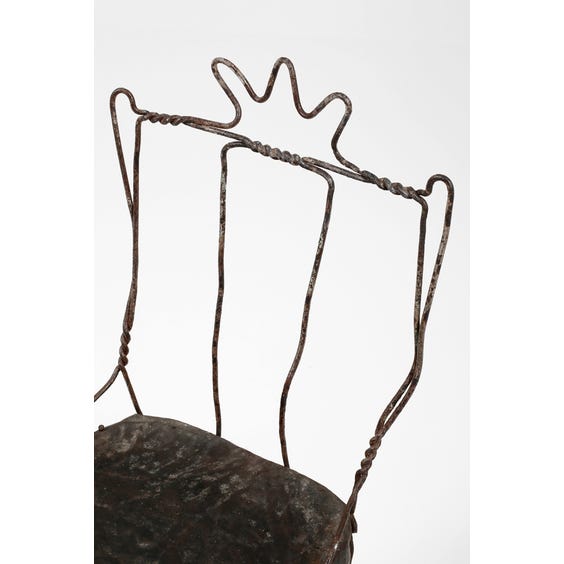 image of Rustic metal twisted wire chair