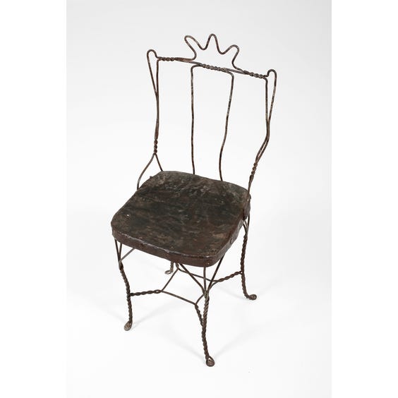 image of Rustic metal twisted wire chair