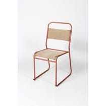 Pale pink metal stacking chair