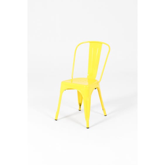 image of Bright lemon yellow metal chair