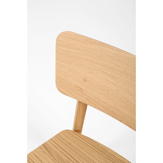 image of Modern soft edge pale oak dining chair