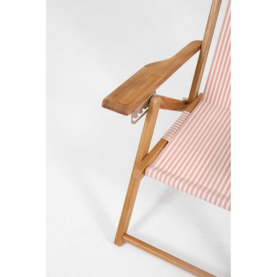 image of Vintage style pink and white stripe deck chair