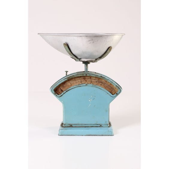 image of Period pale blue weighing scales