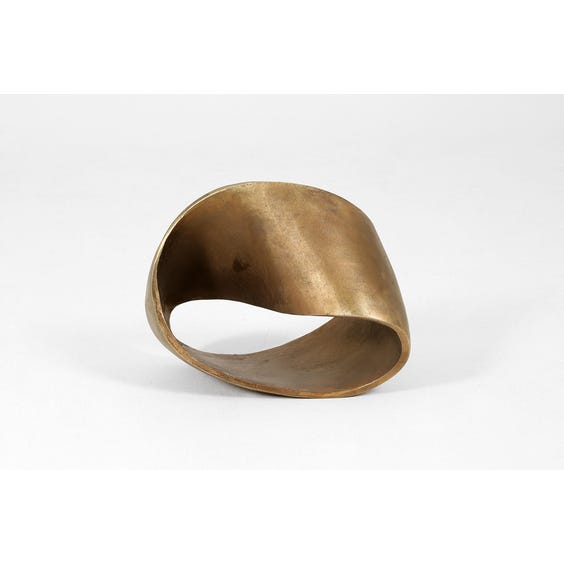 image of Heavy brass ribbon sculpture