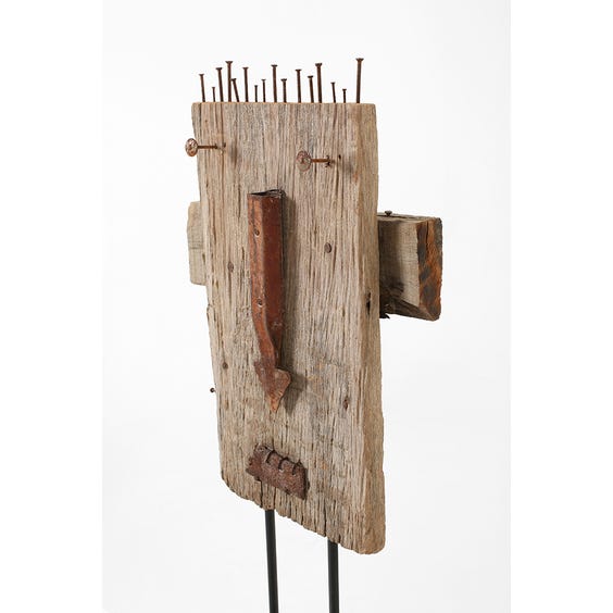 image of Recycled driftwood face sculpture