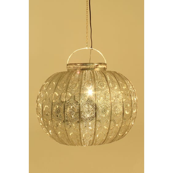 image of Perforated metal pumpkin pendant light