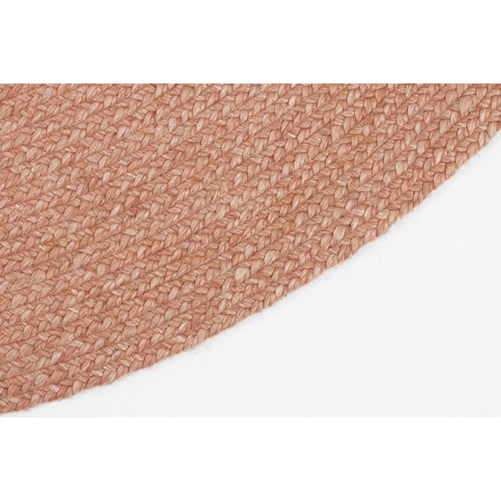 Dusky pink woven circular rug image