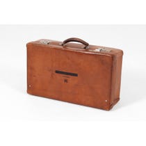 Vintage tan leather suitcase