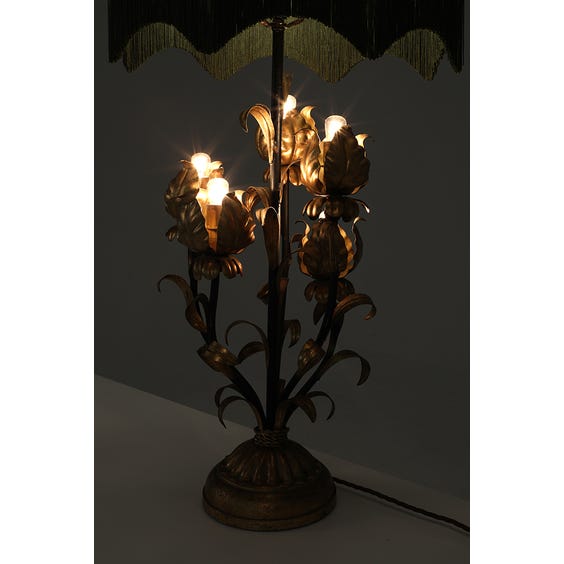 image of Gold leaf table lamp with olive green fringed lamp shade